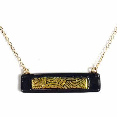 Dichroic yellow circles on black fused glass bar necklace