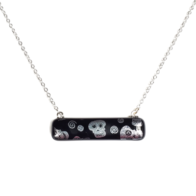 Dichroic silver skulls on black fused glass bar necklace