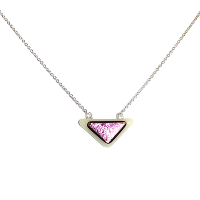 Dichroic pink triangle on white fused glass necklace