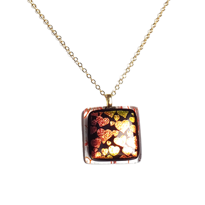Dichroic hearts on red stringers fused glass pendant necklace