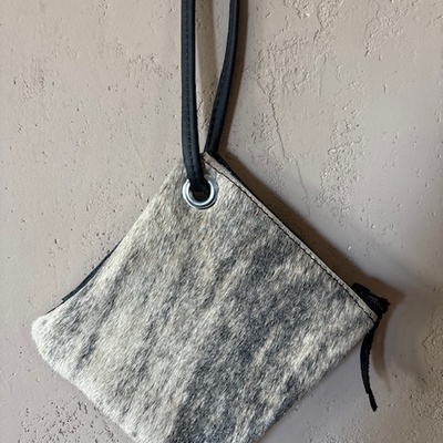 Cow hide clutch