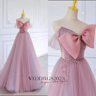 Pink bow tulle strapless floor length with blet lace up back prom dress
