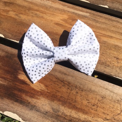 White & silver polka-dot bow
